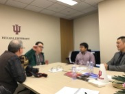 China-related projects being discussed at the Indiana University China Gateway office. (L-R) Jon Kay, Jason Jackson, Peter Wen, and Steven Yin. December 8, 2017. Photograph by Carrie Hertz.