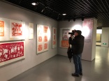 Visiting The Museum of Women and Children in Beijing. Jon Kay photographing the last bits of the women's arts exhibition before de-installation was complete. December 9, 2015. Photograph by Jason Baird Jackson.